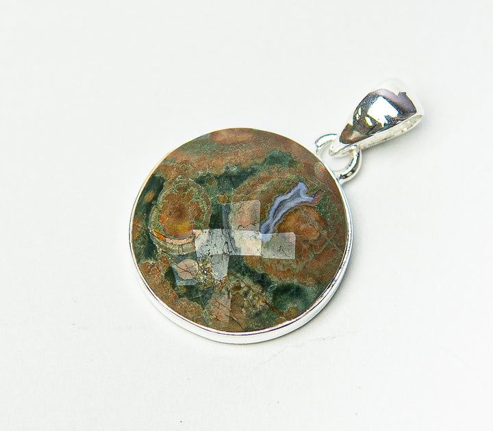 Rhyolite Faceted Round Pendant